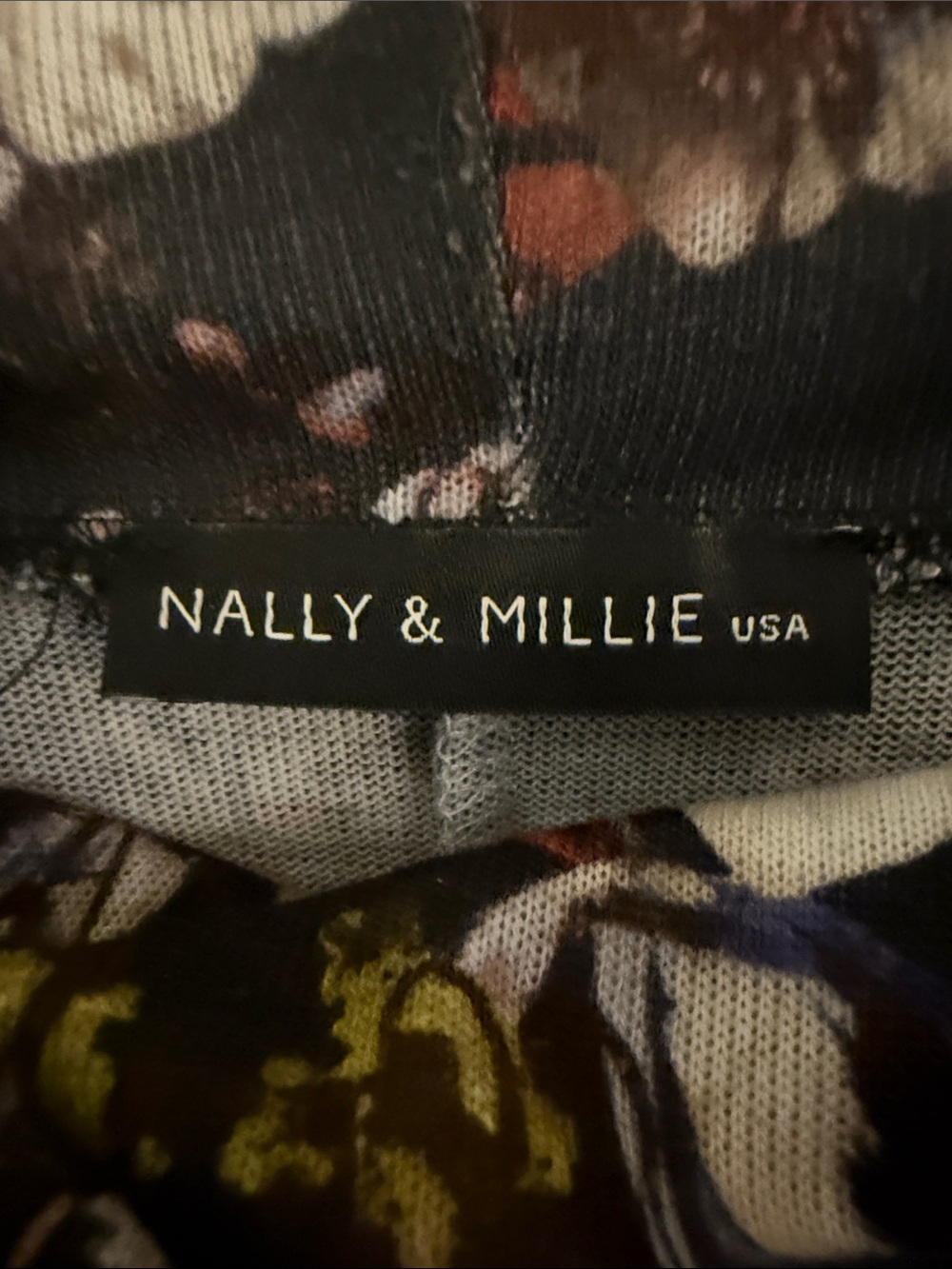 Nally & Millie Black Floral-Print knit Top with Muted Accents